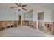 Spacious bedroom revealing opened walls and access to the bathroom in need of renovation at 328 Tallahassee Ne Dr, St Petersburg, FL 33702