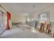 Renovated living room with exposed brick wall, large windows, and sliding glass door, ready for customization at 328 Tallahassee Ne Dr, St Petersburg, FL 33702
