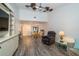 Open living room with high ceilings, modern flooring, and comfortable seating at 35145 Whispering Oaks Blvd, Dade City, FL 33523