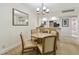 Charming dining area adjacent to a well-equipped kitchen with bar seating at 36750 Us 19 N # 07208, Palm Harbor, FL 34684