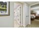 Hallway with views of a bathroom and bedroom, enhancing the home's flow at 36750 Us 19 N # 07208, Palm Harbor, FL 34684