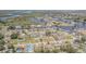 Waterfront community featuring residential homes, canals, and scenic views of the water and surrounding area at 402 12Th Sw St, Ruskin, FL 33570