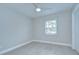 Bedroom with ceiling fan, one window, and hardwood flooring at 4291 Neptune Se Dr, St Petersburg, FL 33705