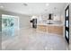 Spacious kitchen with modern finishes and an open layout to the living area at 4291 Neptune Se Dr, St Petersburg, FL 33705