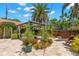 Charming backyard features a gazebo, stone patio, and lush landscaping, perfect for outdoor relaxation and entertaining at 455 18Th Ne Ave, St Petersburg, FL 33704
