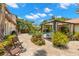 A beautifully landscaped backyard with a pool, gazebo, and outdoor seating, creating a perfect oasis for relaxation at 455 18Th Ne Ave, St Petersburg, FL 33704