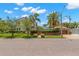 Charming home featuring lush landscaping, a brick street, and a well-maintained lawn, creating inviting curb appeal at 455 18Th Ne Ave, St Petersburg, FL 33704