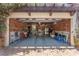 Spacious garage with exposed brick walls, laundry area, and ample storage space, showcasing functionality and character at 455 18Th Ne Ave, St Petersburg, FL 33704