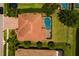 This overhead shot showcases the property's location and private pool at 4611 Grand Preserve Pl, Palm Harbor, FL 34684