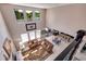 Open-concept living room features high ceilings and seamless flow to the kitchen at 4611 Grand Preserve Pl, Palm Harbor, FL 34684