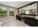 Light-filled main bathroom featuring double sinks, granite countertops, and plenty of storage for your daily routine at 4611 Grand Preserve Pl, Palm Harbor, FL 34684