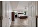 Spacious main bedroom with wood floors, natural light and a large bed at 4611 Grand Preserve Pl, Palm Harbor, FL 34684