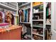 Large walk-in closet providing generous space for your wardrobe, storage, and accessories at 4611 Grand Preserve Pl, Palm Harbor, FL 34684
