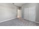 Bedroom with a closet and adjoining door at 4690 Coachford Dr, Wesley Chapel, FL 33543