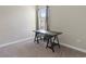 Office featuring window and black desk at 4690 Coachford Dr, Wesley Chapel, FL 33543
