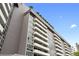 Modern condo building with beautiful balconies and a view of the city skyline at 470 3Rd S St # 602, St Petersburg, FL 33701