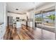 Bright kitchen with an island opens up to an outdoor entertainment area with a pool at 4915 Augusta Ave, Oldsmar, FL 34677