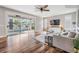 Bright living room with a view of the pool area, creating a seamless indoor-outdoor living experience at 4915 Augusta Ave, Oldsmar, FL 34677
