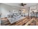 Comfortable living room with stylish furniture and an open floor plan, blending seamlessly with the modern kitchen at 4915 Augusta Ave, Oldsmar, FL 34677