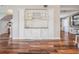 Stylish bar area with display cabinetry perfect for entertaining guests in an open concept space at 4915 Augusta Ave, Oldsmar, FL 34677