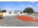 Charming home featuring updated hardscape, fresh landscaping, and a cozy, neutral color palette at 5405 59Th N St, St Petersburg, FL 33709