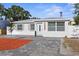 Charming single-story home with a well-maintained front yard and paver driveway, newly renovated at 5405 59Th N St, St Petersburg, FL 33709