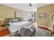 Spacious bedroom with hardwood floors, ceiling fan, and natural light at 546 26Th N Ave, St Petersburg, FL 33704