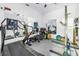 Home gym with mirrors, treadmill, weights and weight lifting machine at 546 26Th N Ave, St Petersburg, FL 33704
