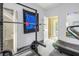 Well-equipped home gym area including weight rack and treadmill at 546 26Th N Ave, St Petersburg, FL 33704