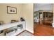 Hallway view with decor on the shelf, leading to the living area at 546 26Th N Ave, St Petersburg, FL 33704