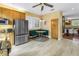 Eat-in kitchen with tile floor, stainless steel fridge, and breakfast nook at 546 26Th N Ave, St Petersburg, FL 33704