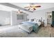 Bright main bedroom with lots of space, dual ceiling fans, and an ensuite bathroom at 546 26Th N Ave, St Petersburg, FL 33704