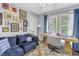 Charming home office with large windows, stylish decor, and comfortable seating area at 546 26Th N Ave, St Petersburg, FL 33704