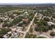 Aerial view showcasing a neighborhood with mature trees and easy access to recreational amenities at 701 59Th Ne Ave, St Petersburg, FL 33703