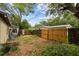 View of the backyard with a fence at 701 59Th Ne Ave, St Petersburg, FL 33703