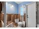 Bathroom features a toilet and window needing renovation at 701 59Th Ne Ave, St Petersburg, FL 33703