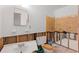 Partially renovated bathroom with exposed plumbing and fixtures in need of remodeling at 701 59Th Ne Ave, St Petersburg, FL 33703