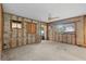 Large living space with concrete floor, awaits your personal touch and creative design at 701 59Th Ne Ave, St Petersburg, FL 33703