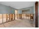 Bright living space features wood-look flooring, neutral walls, and an open floor plan at 701 59Th Ne Ave, St Petersburg, FL 33703