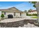 Spacious backyard patio with stone flooring, offering a great space for outdoor dining and entertaining guests at 7032 Pelican Island Dr, Tampa, FL 33634