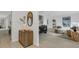 Stylish hallway with chic decor that flows seamlessly into the living room, creating an inviting atmosphere at 7032 Pelican Island Dr, Tampa, FL 33634
