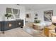Chic living room with modern decor and lots of natural light is perfect for relaxing and entertaining at 7032 Pelican Island Dr, Tampa, FL 33634