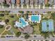 Aerial view of the community pool, tennis and basketball courts, and playground at 7103 Bridgeview Dr, Wesley Chapel, FL 33545