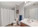 Bathroom showing the shower, sink, and toilet at 7103 Bridgeview Dr, Wesley Chapel, FL 33545