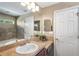 Bathroom showing the sink and vanity countertop, as well as a full mirror at 7103 Bridgeview Dr, Wesley Chapel, FL 33545