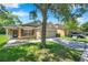 Charming single-story home featuring a well-manicured lawn, neutral paint, and a two-car garage at 7103 Bridgeview Dr, Wesley Chapel, FL 33545