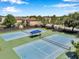 Aerial view of two well-maintained community tennis courts on a sunny day at 7103 Bridgeview Dr, Wesley Chapel, FL 33545