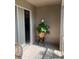 Relaxing patio with sliding glass door, adorned with vibrant peace lily centerpiece at 7838 66Th N Way, Pinellas Park, FL 33781