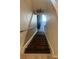 Wooden staircase leading to the upper level at 7838 66Th N Way, Pinellas Park, FL 33781