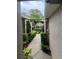 Green landscaping lines the walkway to the entrance of this lovely townhome at 7838 66Th N Way, Pinellas Park, FL 33781